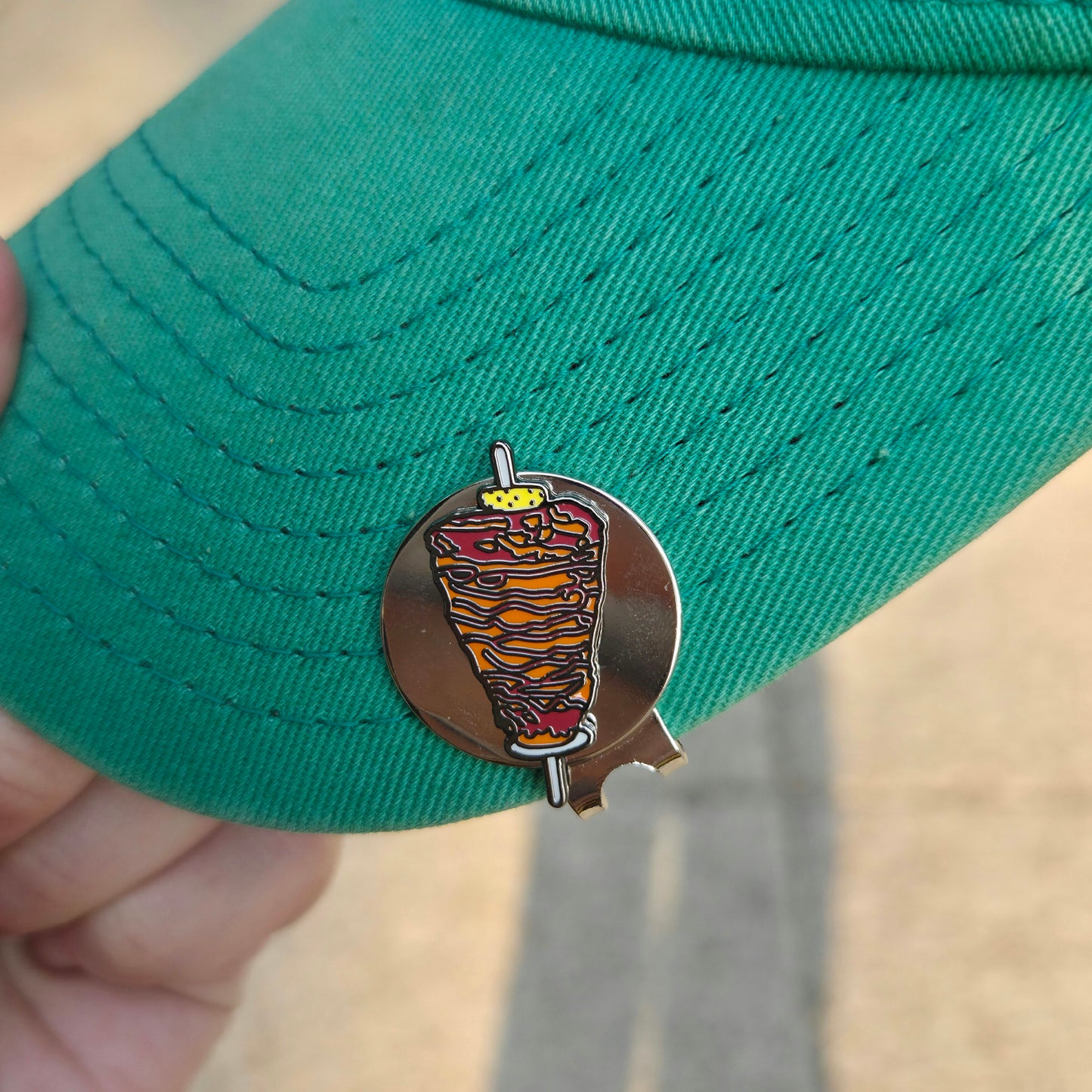 Marca de pelota de golf "El Trompo"